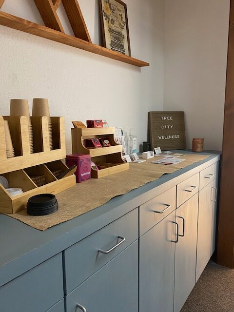 decorating a therapy office tea and water station with business cards